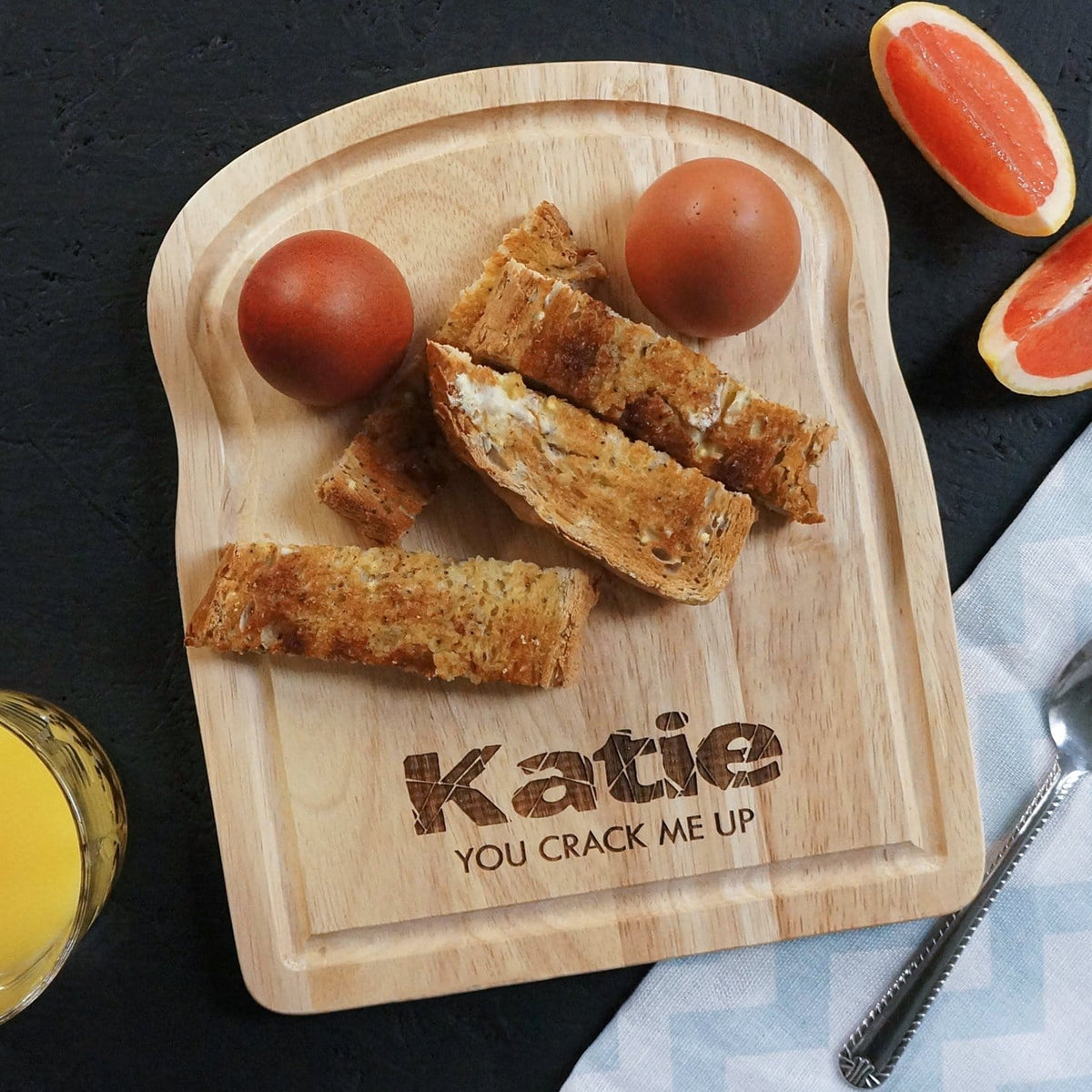 Wooden egg breakfast board with personalisation by Original Monkey Gifts.