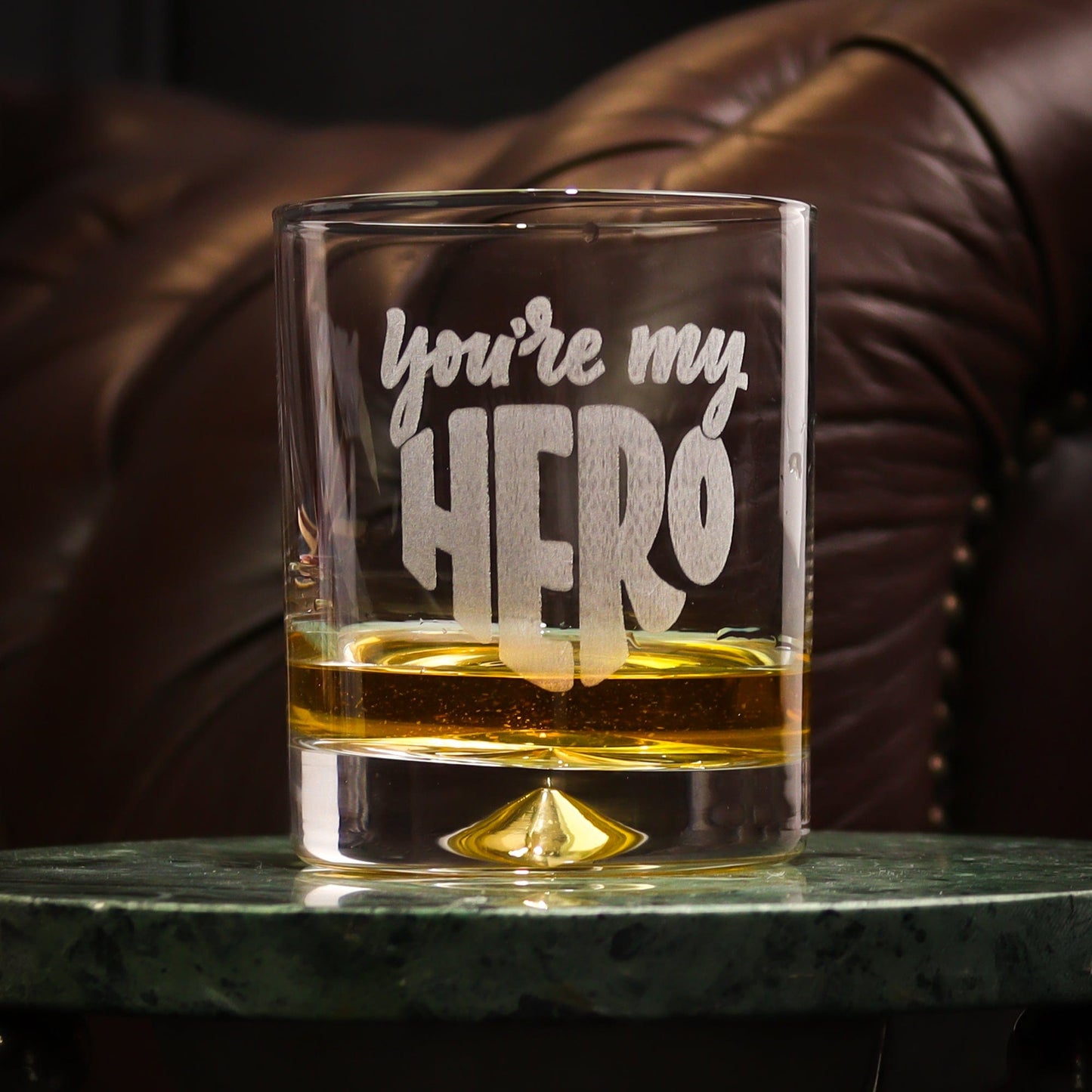 Heavyweight whiskey tumbler with a solid dimple base, laser-engraved with "You're My Hero" on the front. A meaningful and stylish gift for fathers, mentors, or loved ones. Optional personalised gift box available for an extra special touch.