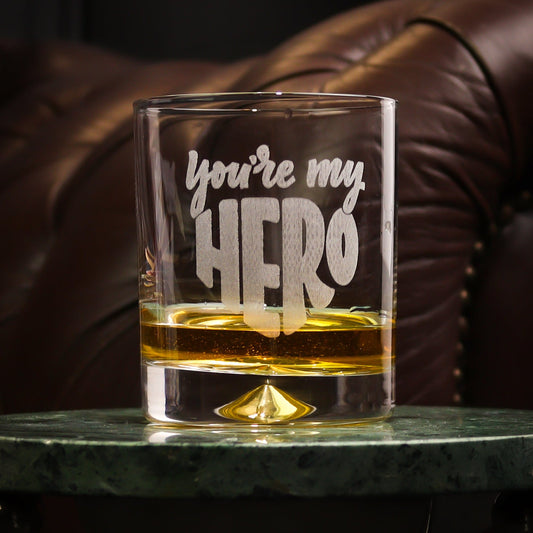 Heavyweight whiskey tumbler with a solid dimple base, laser-engraved with "You're My Hero" on the front. A meaningful and stylish gift for fathers, mentors, or loved ones. Optional personalised gift box available for an extra special touch.