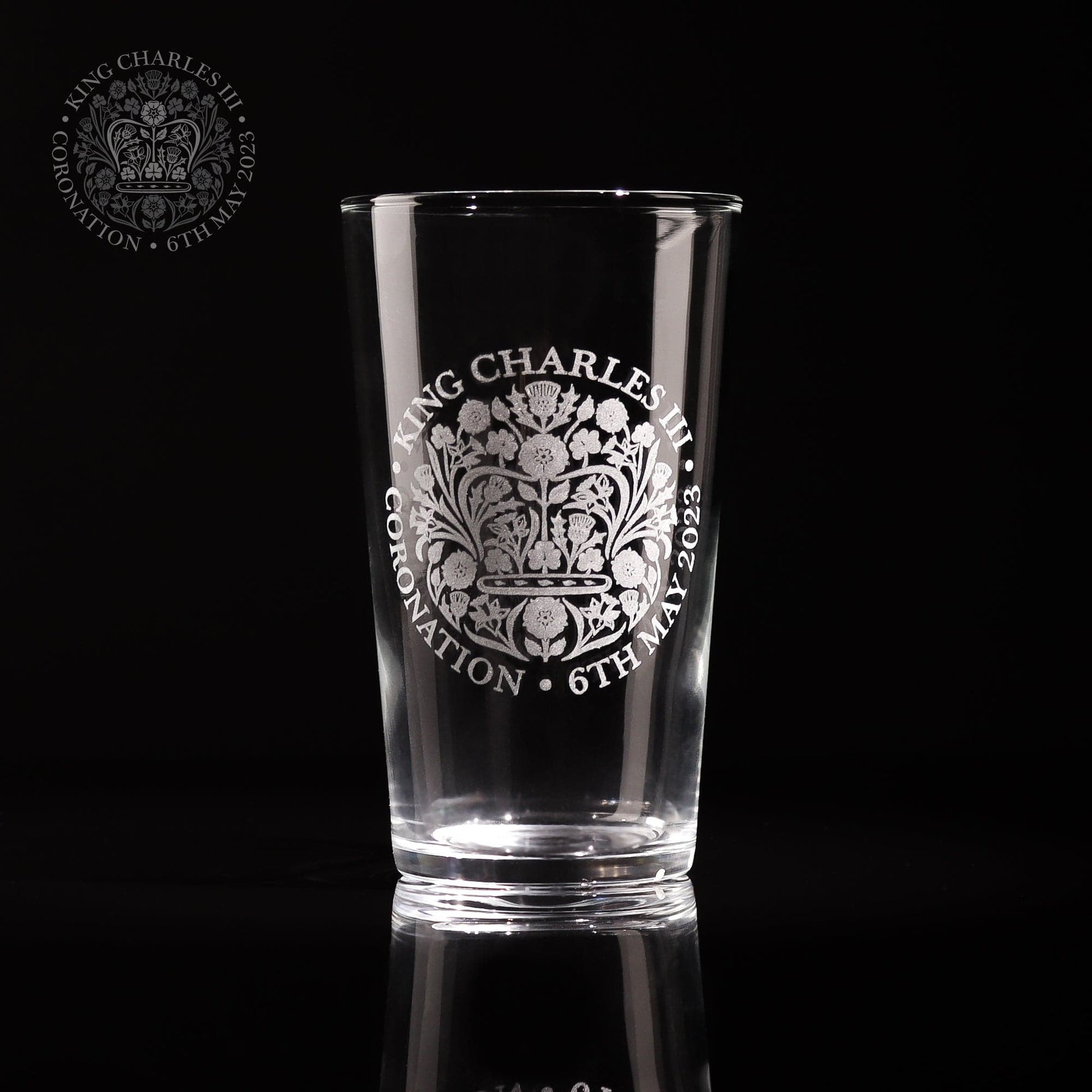 A beautiful pint glass engraved with the official emblem for the coronation of King Charles III the glass comes with a gift box which is also engraved with the same logo making it a great for any collection of royal memorabilia